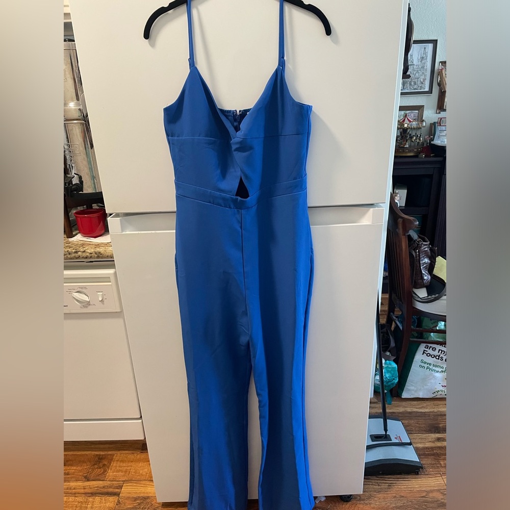 Classic blue spaghetti strap jumpsuit with keyhole and straight leg. Never worn